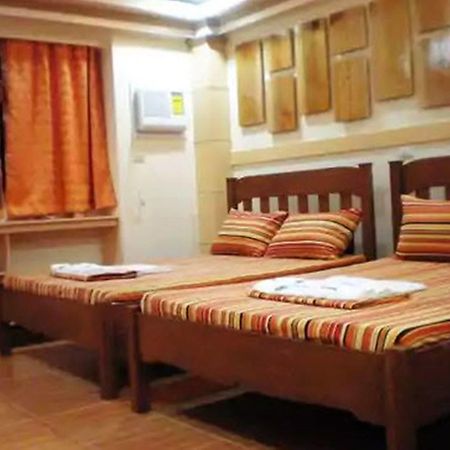 Apartelle De Francesca Puerto Galera Esterno foto